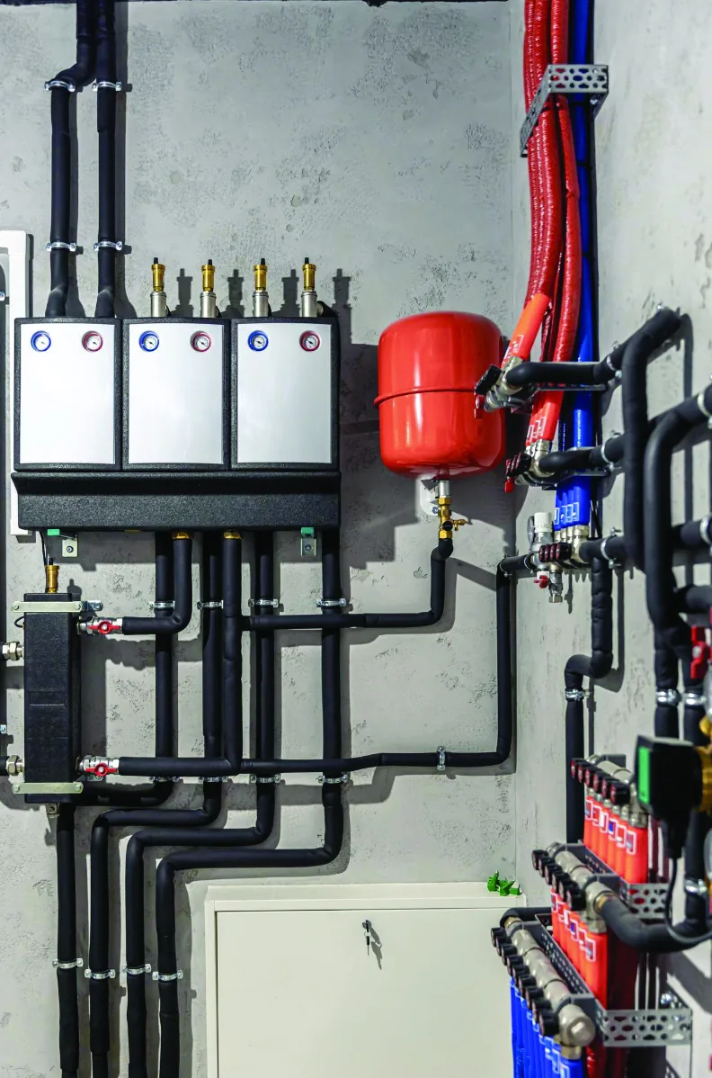 Fire suppression distribution pipework serving kitchen exhaust hood and duct